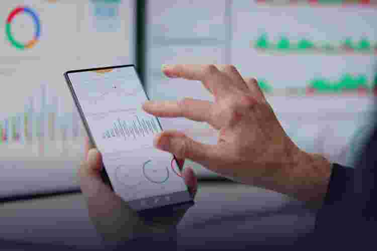 Business finance data analytics graph. Advisor using KPI Dashboard on virtual screen. Financial management technology